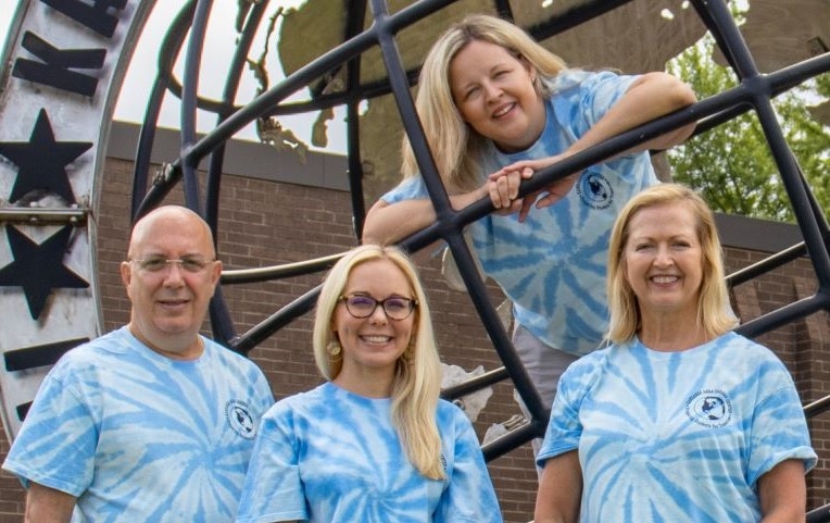 Top Center: Crystal Pena; Front L to R: Robert de Oliveira, Krystal Smith, and Melinda Hogan